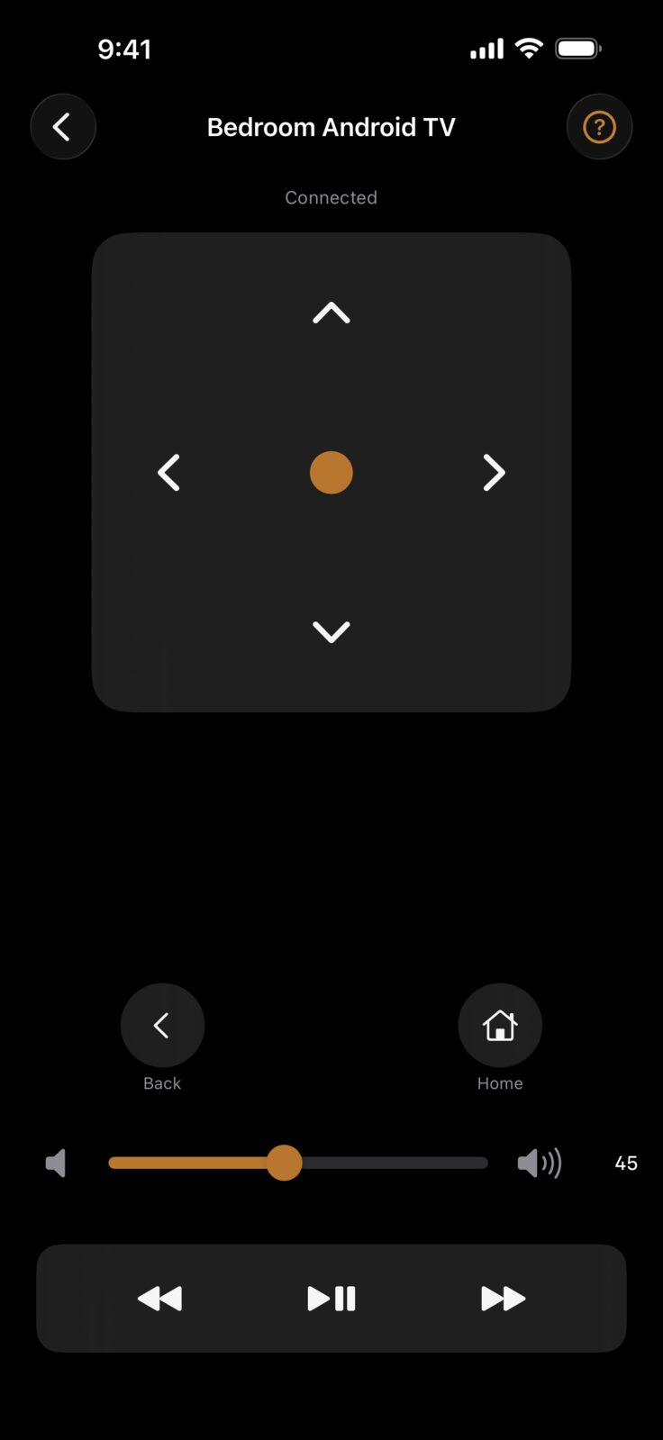 Dirigo's Android TV remote screen for a device named Bedroom Android TV, showing Connected beneath the title: a directional pad with a bronze centre select button, round Back and Home buttons, a volume slider at 45, and rewind, play/pause and fast-forward transport controls.